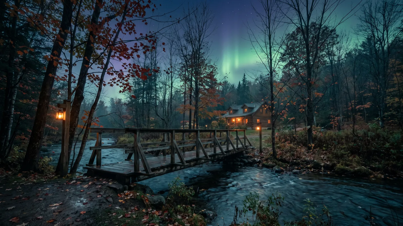 A Gatineau Park trail near Old Chelsea in autumn at dusk under the northern lights